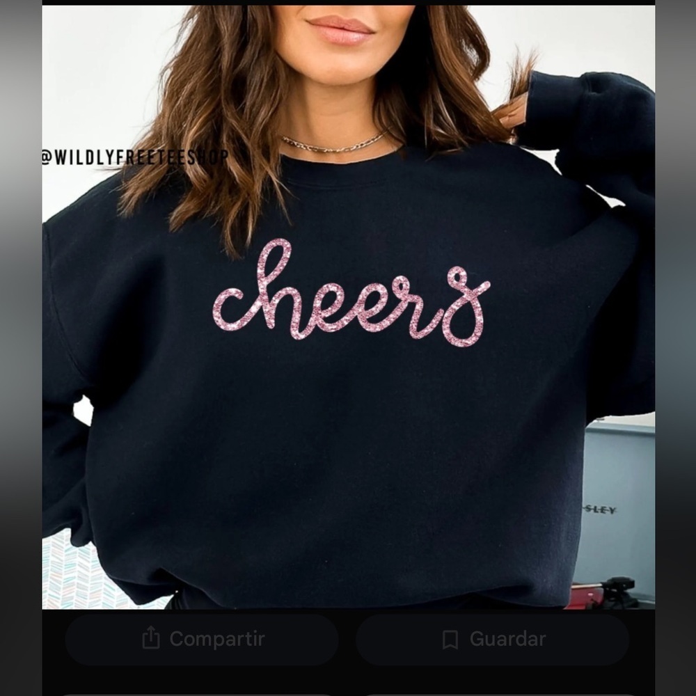 Jesรบs Lea Black Sweatshirt with Pink 'Cheers' Design
Caja 8